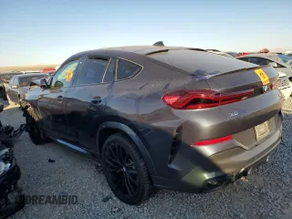 2021 BMW X6 M50i with VIN 5UXCY8C02M9G71110, listed as a Copart auction lot 76124114 with 0 mi miles and Salvage Title. Bid and sale history available at carsss.com. Image 2.