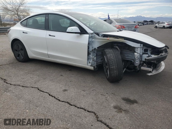 2023 Tesla Model 3 with VIN 5YJ3E1EA5PF413923, listed as a Copart auction lot 49008435 with 28,373 mi miles and Salvage Title. Bid and sale history available at DreamBid. Image 4.