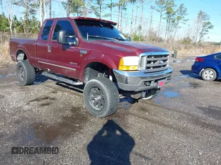 2000 Ford Super Duty F-250 XL with VIN 1FTNX21F2YED59185, listed as a IAAI auction lot 41334213 with 142,096 mi miles. Bid and sale history available at carsss.com. Image 1.