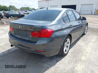 2013 BMW 3 Series 320i with VIN WBA3B1C5XDF462859, listed as a IAAI auction lot 42191369 with 140,253 mi miles and . Bid and sale history available at carsss.com. Image 4.