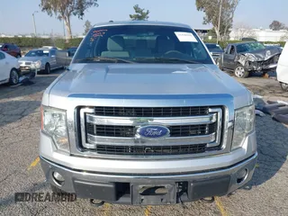 2014 Ford F-150 XL with VIN 1FTFW1EF9EKF99892, listed as a IAAI auction lot 41428456 with 128,659 mi miles and . Bid and sale history available at carsss.com. Image 13.