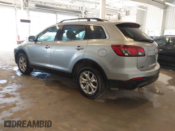 2015 Mazda CX-9 Touring with VIN JM3TB3CV5F0464675, listed as a IAAI auction lot 41656291 with 127,033 mi miles. Bid and sale history available at carsss.com. Image 3.