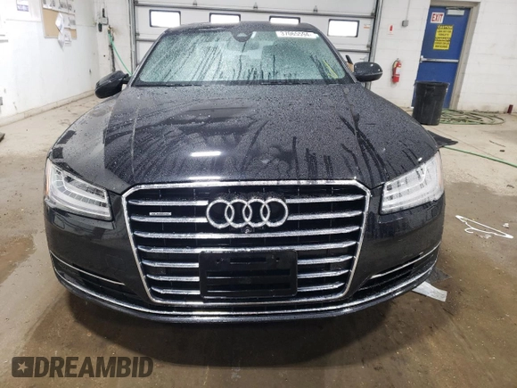 2015 Audi A8 4.0T z VIN WAU32AFD0FN017865, wystawiony jako Copart lot #37065594 z przebiegiem 55 632 mil mil oraz Szkoda całkowita • Salvage title. Historia ofert i sprzedaży dostępna na DreamBid. Obrazek 5.