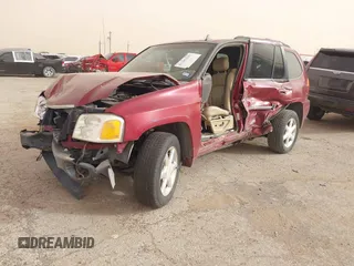 2007 GMC Envoy SLE with VIN 1GKDT13S972277907, listed as a IAAI auction lot 41367293 with 194,760 mi miles. Bid and sale history available at carsss.com. Image 2.