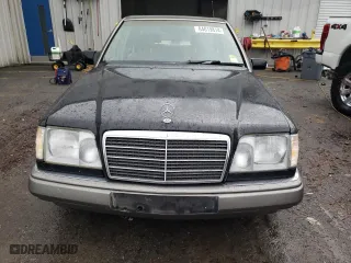1995 Mercedes-Benz E Class with VIN WDBEB31E6SC142087, listed as a Copart auction lot 84019814 with 231,961 mi miles and Salvage Title. Bid and sale history available at carsss.com. Image 5.