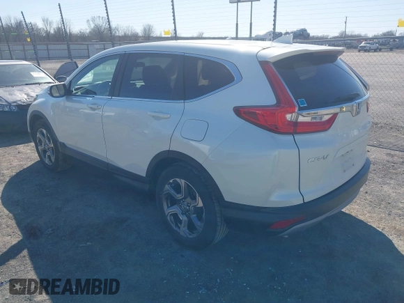 2017 Honda CR-V EX with VIN 2HKRW1H58HH519386, listed as a IAAI auction lot 41777509 with 76,499 mi miles. Bid and sale history available at carsss.com. Image 3.