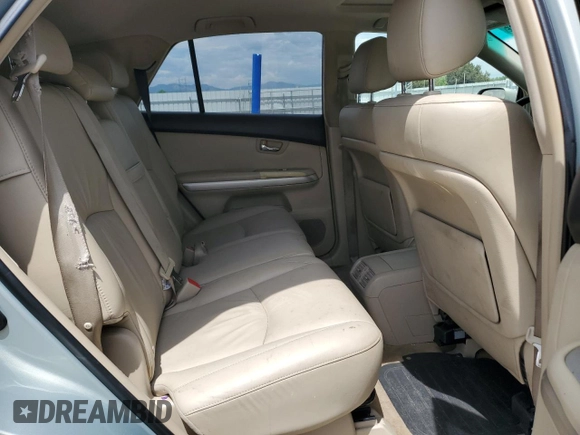 2006 Lexus RX 400h z VIN JTJHW31UX60005264, wystawiony jako Copart lot #58172795 z przebiegiem 140 056 mil mil oraz Szkoda całkowita • Salvage title. Historia ofert i sprzedaży dostępna na DreamBid. Obrazek 11.