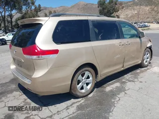 2012 Toyota Sienna LE AAS with VIN 5TDKK3DC5CS186077, listed as a IAAI auction lot 40265988 with 130,888 mi miles and . Bid and sale history available at DreamBid. Image 4.