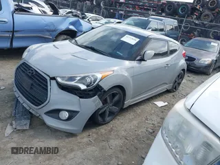 2014 Hyundai Veloster Turbo with VIN KMHTC6AE7EU199478, listed as a IAAI auction lot 41772626 with 162,985 mi miles. Bid and sale history available at carsss.com. Image 2.