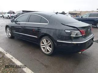 2013 Volkswagen CC Lux with VIN WVWRP7AN7DE510490, listed as a IAAI auction lot 41457328 with 154,443 mi miles. Bid and sale history available at carsss.com. Image 3.
