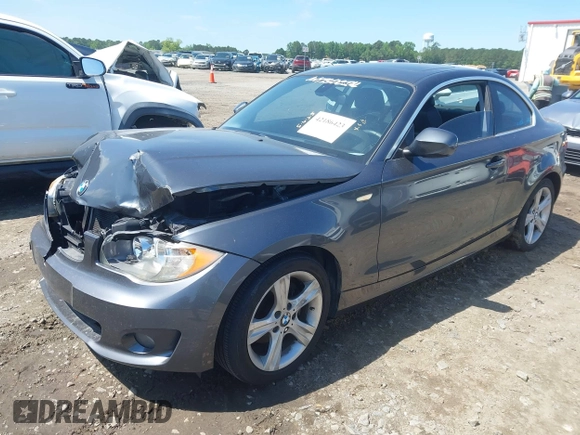 2013 BMW 1 Series 128i with VIN WBAUP7C57DVP25145, listed as a IAAI auction lot 42186423 with 131,222 mi miles and . Bid and sale history available at DreamBid. Image 2.