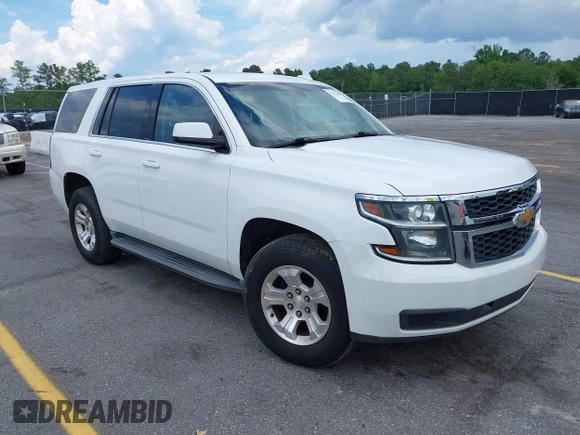 2015 Chevrolet Tahoe Commercial z VIN 1GNLC2EC1FR721538, wystawiony jako IAAI lot #42274601 z przebiegiem 138 991 mil mil oraz . Historia ofert i sprzedaży dostępna na DreamBid. Obrazek 1.