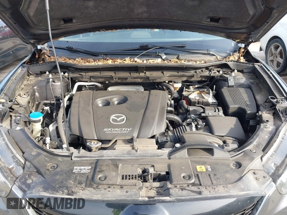 2014 Mazda CX-5 Grand Touring with VIN JM3KE2DY7E0345742, listed as a IAAI auction lot 41864116 with 158,746 mi miles. Bid and sale history available at carsss.com. Image 10.