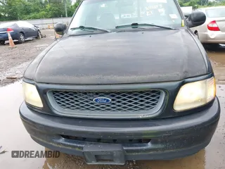 1998 Ford F-150 with VIN 1FTYF17W0WNC12927, listed as a IAAI auction lot 42621641 with 251,079 mi miles and . Bid and sale history available at DreamBid. Image 6.