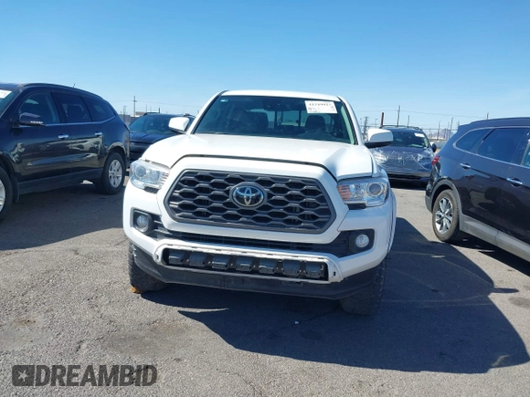 2021 Toyota Tacoma SR with VIN 3TYAX5GN5MT014868, listed as a IAAI auction lot 41549927 with 30,653 mi miles and . Bid and sale history available at DreamBid. Image 6.
