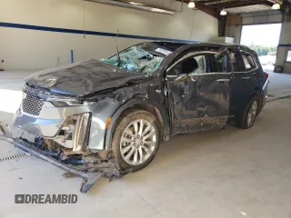 2020 Cadillac XT6 FWD Premium Luxury with VIN 1GYKPCRS0LZ207041, listed as a Copart auction lot 74805654 with 0 mi miles and Salvage Title. Bid and sale history available at carsss.com. Image 1.