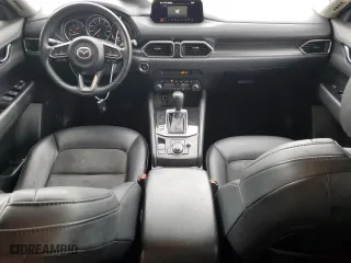 2020 Mazda CX-5 Touring with VIN JM3KFACM6L0797748, listed as a Copart auction lot 44573645 with 104,094 mi miles and Salvage Title. Bid and sale history available at carsss.com. Image 8.