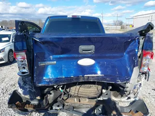 2007 Ford F-150 STX with VIN 1FTRX02W57KD56589, listed as a IAAI auction lot 41189911 with 140,093 mi miles. Bid and sale history available at carsss.com. Image 6.