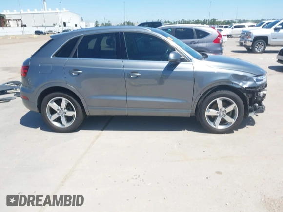 2015 Audi Q3 Prestige with VIN WA1GFCFS7FR013818, listed as a IAAI auction lot 41975076 with 60,295 mi miles and . Bid and sale history available at DreamBid. Image 14.