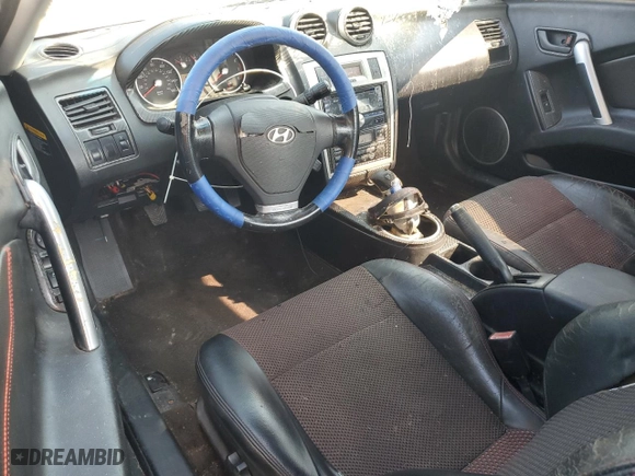 2006 Hyundai Tiburon GT with VIN KMHHN65F56U213172, listed as a Copart auction lot 75211144 with 199,754 mi miles and Salvage Title. Bid and sale history available at carsss.com. Image 8.