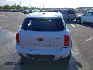 2013 MINI Countryman with VIN WMWZB3C52DWR35806, listed as a IAAI auction lot 42184010 with 93,380 mi miles and . Bid and sale history available at DreamBid. Image 16.