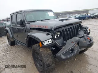 2021 Jeep Gladiator Mojave with VIN 1C6JJTEG2ML565242, listed as a IAAI auction lot 38098327 with 58,005 mi miles and . Bid and sale history available at DreamBid. Image 1.