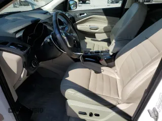 2015 Ford Escape Titanium with VIN 1FMCU0J93FUA58325, listed as a Copart auction lot 64135685 with 126,356 mi miles and Salvage title. Bid and sale history available at DreamBid. Image 7.