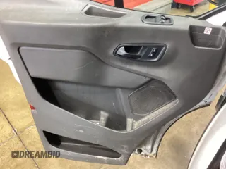 2020 Ford Transit Cargo with VIN 1FTBR1CG6LKB75357, listed as a IAAI auction lot 42243287 with 100,958 mi miles and . Bid and sale history available at DreamBid. Image 2.