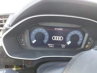 2021 Audi Q3 S line Premium z VIN WA1DECF35M1063868, wystawiony jako IAAI lot #42247128 z przebiegiem 89 959 mil mil oraz . Historia ofert i sprzedaży dostępna na DreamBid. Obrazek 7.