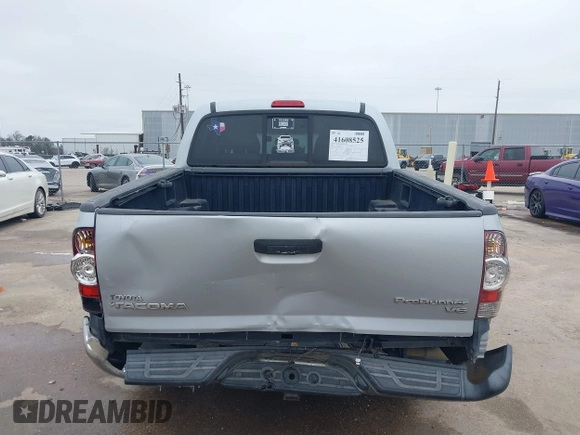 2009 Toyota Tacoma PreRunner with VIN 3TMJU62NX9M081748, listed as a IAAI auction lot 41608525 with 210,999 mi miles. Bid and sale history available at carsss.com. Image 6.