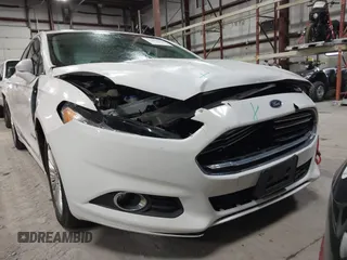 2013 Ford Fusion SE Hybrid with VIN 3FA6P0LU7DR254983, listed as a IAAI auction lot 41883531 with 188,585 mi miles and . Bid and sale history available at carsss.com. Image 13.