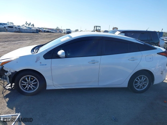 2021 Toyota Prius L Eco with VIN JTDKAMFU7M3148089, listed as a IAAI auction lot 41614915 with 119,725 mi miles. Bid and sale history available at carsss.com. Image 15.