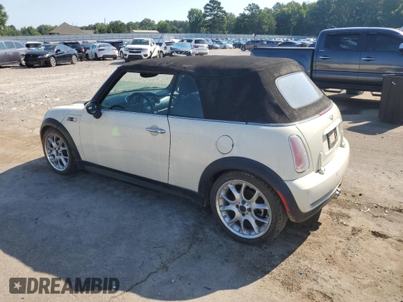 2006 MINI Convertible S с VIN WMWRH33546TF85908, выставлен на аукционе Copart как лот 61363025 с пробегом 105 053 миль миль и Списание • Salvage title. История ставок и продаж доступна на DreamBid. Изображение 2.
