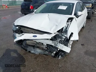 2019 Ford Fusion Hybrid SE with VIN 3FA6P0LUXKR104850, listed as a IAAI auction lot 41870242 with 114,943 mi miles. Bid and sale history available at carsss.com. Image 6.