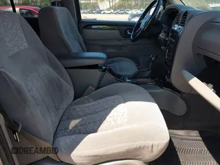 2004 GMC Envoy SLE with VIN 1GKDT13S042113411, listed as a IAAI auction lot 42117824 with 116,827 mi miles. Bid and sale history available at carsss.com. Image 5.