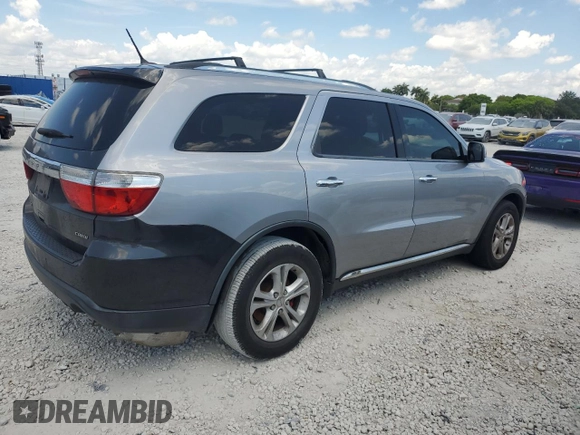 2013 Dodge Durango Crew z VIN 1C4RDJDGXDC696119, wystawiony jako Copart lot #58226905 z przebiegiem 154 915 mil mil oraz Czysty tytuł • Clean title. Historia ofert i sprzedaży dostępna na DreamBid. Obrazek 3.