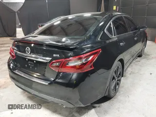 2017 Nissan Altima SV with VIN 1N4AL3AP4HC239740, listed as a IAAI auction lot 41971212 with 104,823 mi miles and . Bid and sale history available at carsss.com. Image 4.