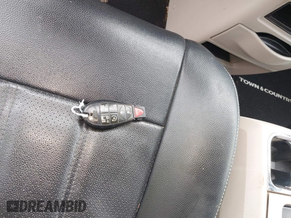 2013 Chrysler Town & Country Touring L with VIN 2C4RC1CG7DR510466, listed as a IAAI auction lot 42180370 with 103,821 mi miles and . Bid and sale history available at DreamBid. Image 11.