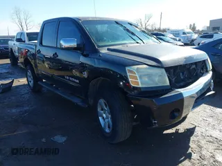 2004 Nissan Titan LE with VIN 1N6AA07A44N591357, listed as a IAAI auction lot 41464024 with 296,954 mi miles and . Bid and sale history available at DreamBid. Image 1.