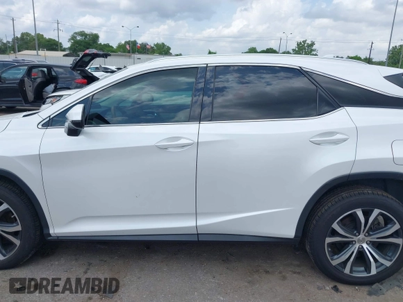 2016 Lexus RX 350 z VIN 2T2ZZMCAXGC001550, wystawiony jako IAAI lot #42083488 z przebiegiem 93 377 mil mil oraz . Historia ofert i sprzedaży dostępna na DreamBid. Obrazek 14.
