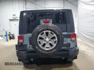 2014 Jeep Wrangler Sport with VIN 1C4AJWAG9EL322982, listed as a Copart auction lot 51145075 with 122,686 mi miles and Salvage Title. Bid and sale history available at DreamBid. Image 6.