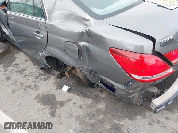 2006 Toyota Avalon XL with VIN 4T1BK36B16U111487, listed as a IAAI auction lot 41816193 with 214,557 mi miles. Bid and sale history available at carsss.com. Image 6.
