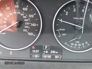 2014 BMW 3 Series 328i z VIN WBA3A5G52ENP31707, wystawiony jako IAAI lot #41944963 z przebiegiem 158 180 mil mil oraz . Historia ofert i sprzedaży dostępna na DreamBid. Obrazek 7.