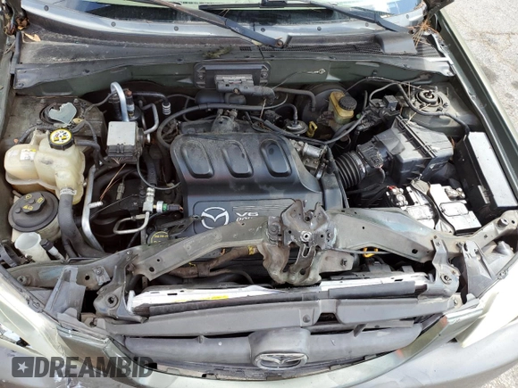 2002 Mazda Tribute LX with VIN 4F2YU09122KM55085, listed as a Copart auction lot 71604184 with 185,158 mi miles and Salvage Title. Bid and sale history available at DreamBid. Image 12.