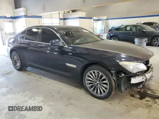 2011 BMW 7 Series 740i with VIN WBAKA4C53BC392488, listed as a Copart auction lot 77876674 with 0 mi miles and Salvage Title. Bid and sale history available at carsss.com. Image 4.