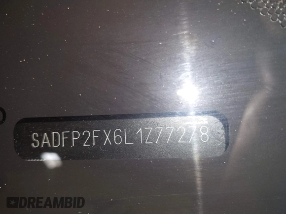 2020 Jaguar E-Pace SE z VIN SADFP2FX6L1Z77278, wystawiony jako IAAI lot #41804212 z przebiegiem 93 126 mil mil oraz . Historia ofert i sprzedaży dostępna na DreamBid. Obrazek 19.