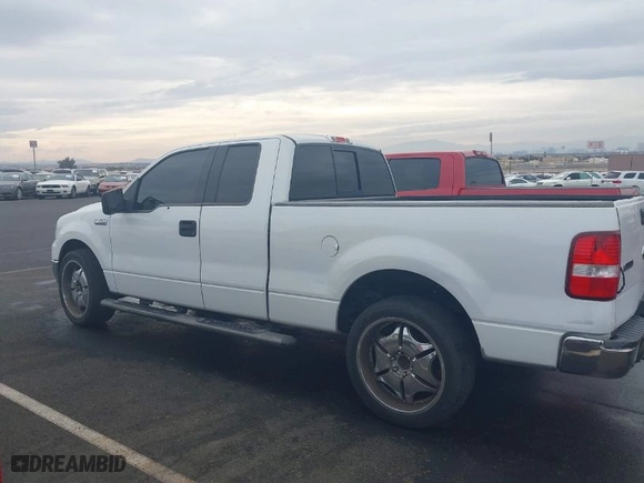 2004 Ford F-150 XL with VIN 1FTPX12574NB21111, listed as a IAAI auction lot 41439224 with 212,887 mi miles. Bid and sale history available at carsss.com. Image 13.