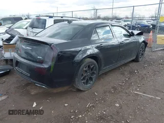 2015 Chrysler 300 with VIN 2C3CCAGGXFH831351, listed as a IAAI auction lot 41721941 with 106,577 mi miles. Bid and sale history available at carsss.com. Image 4.