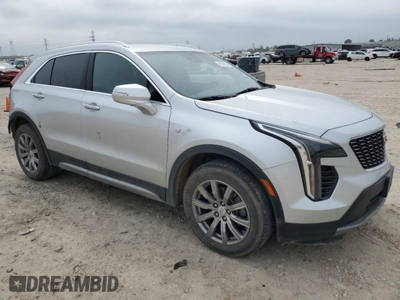 2021 Cadillac XT4 FWD Premium Luxury with VIN 1GYFZCR41MF002411, listed as a Copart auction lot 49746855 with 81,938 mi miles and Salvage title. Bid and sale history available at DreamBid. Image 4.