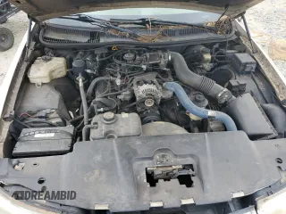 2001 Lincoln Town Car Cartier L z VIN 1LNHM85W61Y640344, wystawiony jako Copart lot #74755564 z przebiegiem Nie podano mil oraz Szkoda całkowita • Salvage title. Historia ofert i sprzedaży dostępna na DreamBid. Obrazek 11.